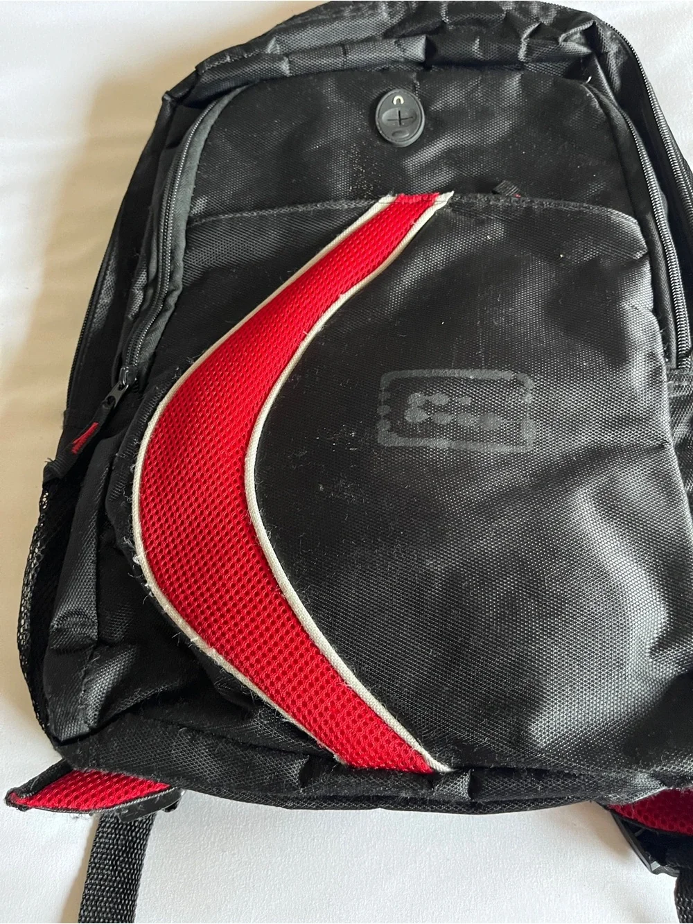 Black & Red Multi-Pocket Backpack with Media Port & Mesh Side Pockets